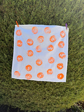 Load image into Gallery viewer, handprinted cotton dish towel with neon orange orange print
