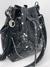 Load image into Gallery viewer, Black Leather Drawstring Bucket Shoulder Bag With Matte White Splatter
