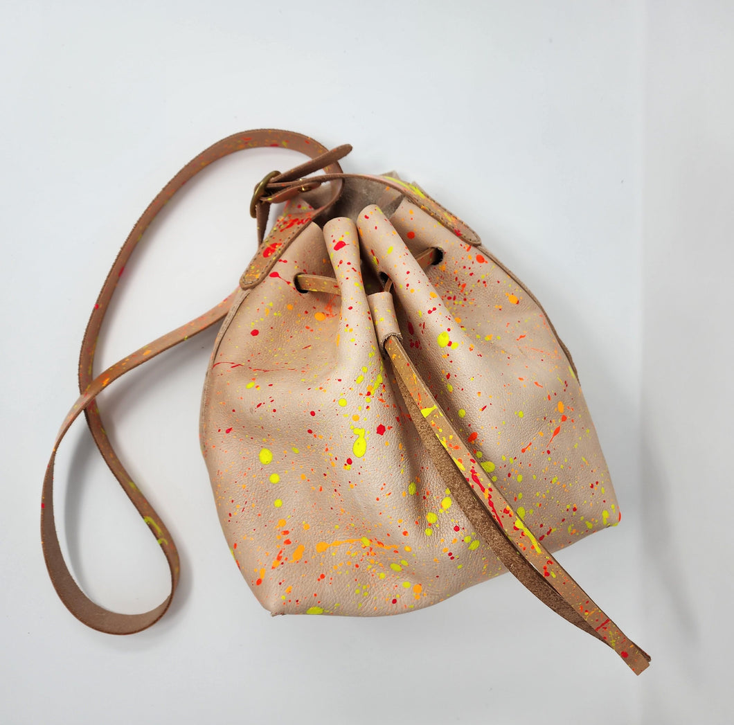 Neon Splatter Leather Drawstring Crossbody Bucket Bag